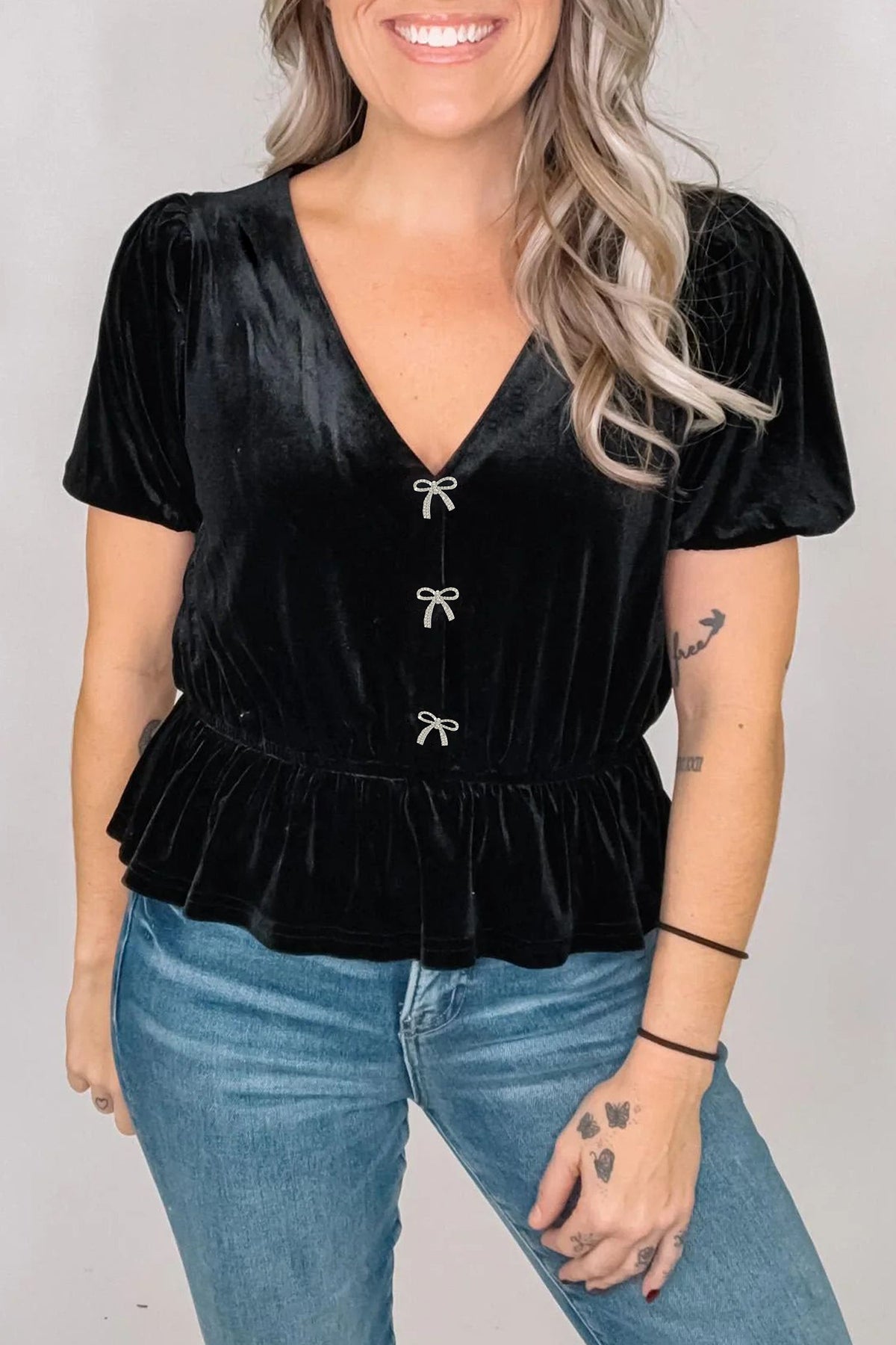 Black V Neck Bow Decorations Peplum Hem Shift Silhouette Short Sleeve Blouse — image 01