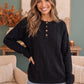 Get Organized Henley Knit Sweater in Black